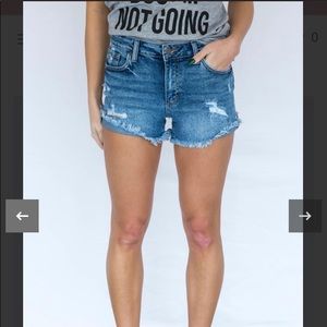 Distressed denim shorts